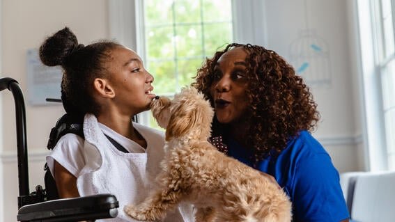 Wish kid Shanya and Barbara with Fluffy