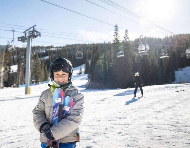 Wish kid Levi on ski mountain during wish day