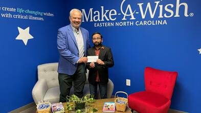 Wish kid Neel with Make-A-Wish President Chris Winter