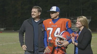 Wish Alumni Coby in high school with his parents