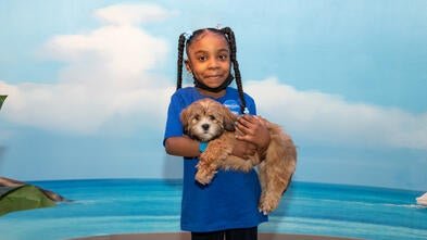 Wish Kid Kennadi with puppy