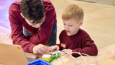 Grant building a robot