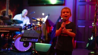 Nolan on the mic during his wish celebration