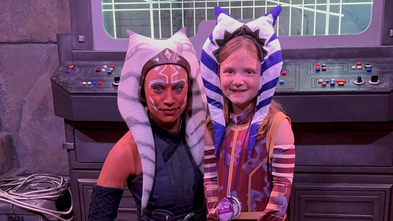 Wish kid Graysen, 6, with her hero, Star Wars character Ahsoka, at Disney World