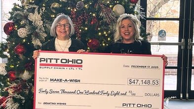 Pitt Ohio presents Make-A-Wish Director of Development, Stephanie Pugliese with a donation to local wishes