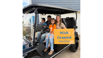 wish family in golf cart
