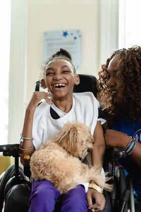 Wish kid Shanya, Volunteer Barbara and Fluffy