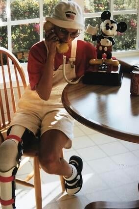 Wish alum Jen on the phone