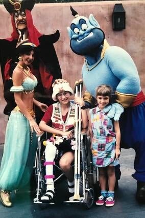 Wish alum Jen with Jasmin and Aladdin Characters